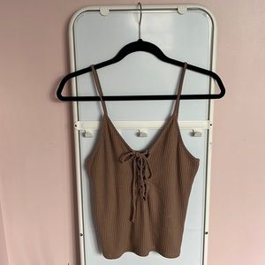 Tan tank top with tie detaining on front